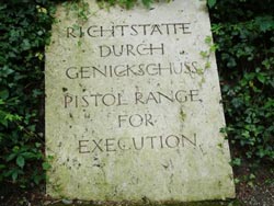 Marker for mass grave in Dachau concentration camp